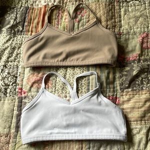 Size L (12) set of 2 Athleta Girl sports bras.